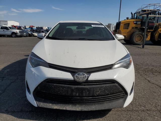 VIN 5YFBURHE8HP601126 2017 Toyota Corolla, L no.5