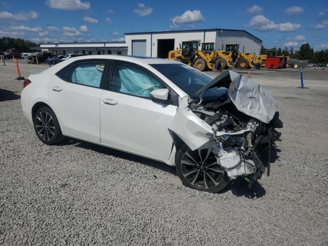 VIN 5YFBURHE3HP609859 2017 Toyota Corolla, L no.4