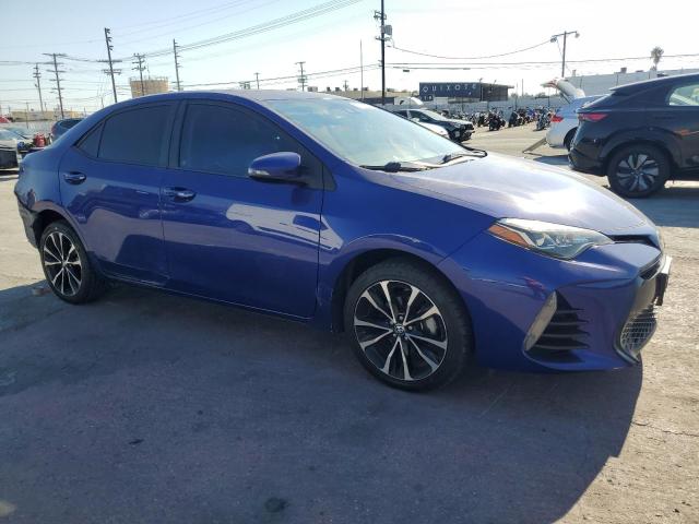 VIN 5YFBURHE5HP639557 2017 Toyota Corolla, L no.4