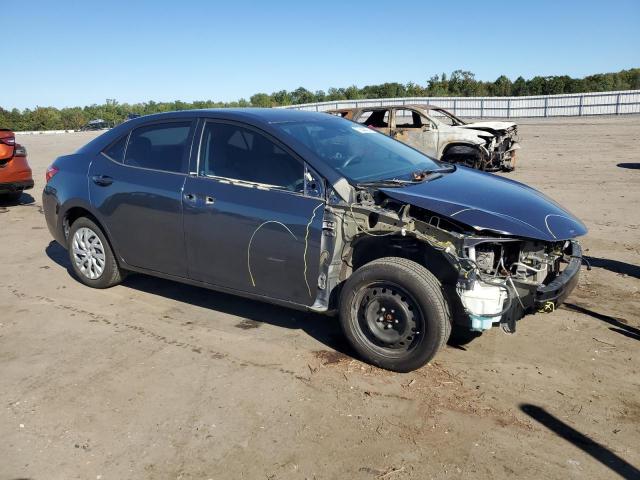 VIN 5YFBURHE5HP699967 2017 Toyota Corolla, L no.4