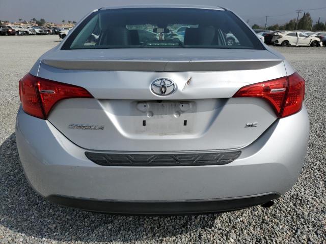 VIN 5YFBURHE5HP615291 2017 Toyota Corolla, L no.6