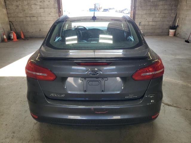 VIN 1FADP3F24FL218494 2015 Ford Focus, SE no.6