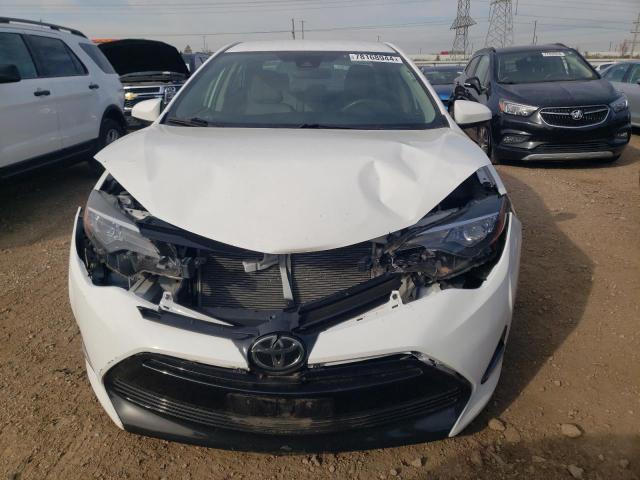 VIN 5YFBURHE9JP773574 2018 Toyota Corolla, L no.5