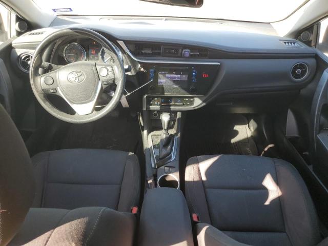 VIN 5YFBURHE4JP748338 2018 Toyota Corolla, L no.8