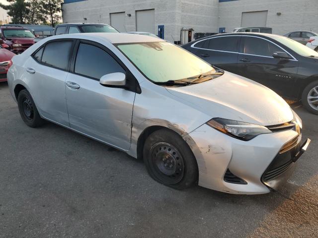 VIN 5YFBURHEXHP584295 2017 Toyota Corolla, L no.4