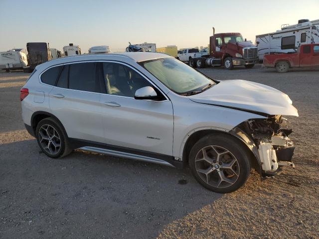 VIN WBXHU7C34J5H43034 2018 BMW X1 no.4