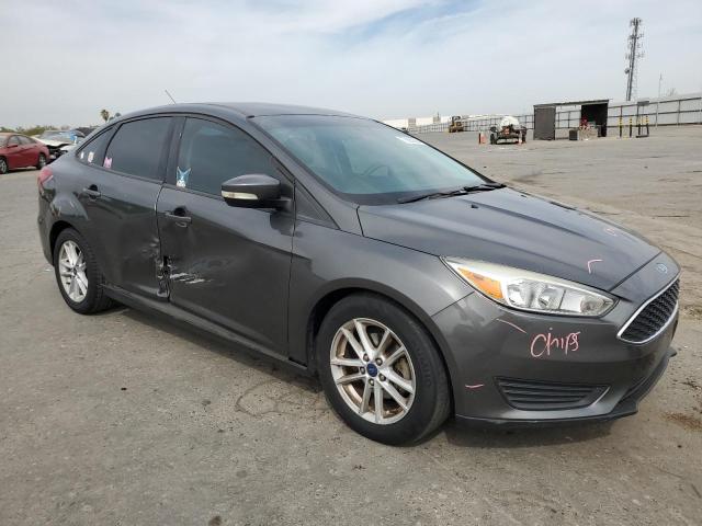 VIN 1FADP3F2XHL329358 2017 Ford Focus, SE no.4