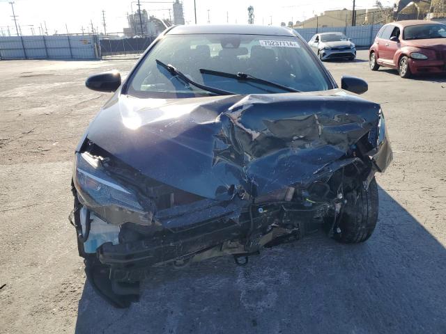 VIN 5YFBURHE9JP795977 2018 Toyota Corolla, L no.5