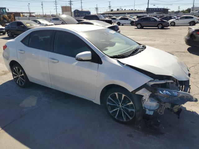 VIN 5YFBURHE0HP720708 2017 Toyota Corolla, L no.4