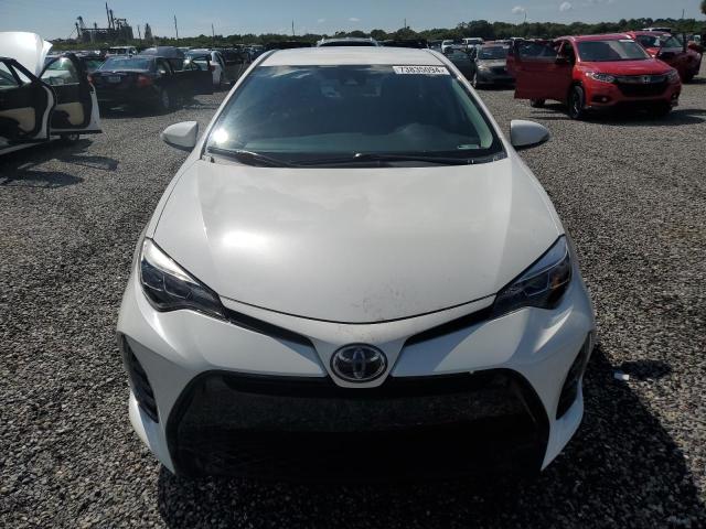 VIN 5YFBURHE9JP840982 2018 Toyota Corolla, L no.5