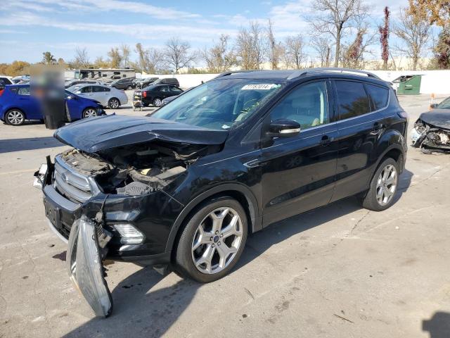 2017 FORD ESCAPE TIT - 1FMCU9JDXHUB79980