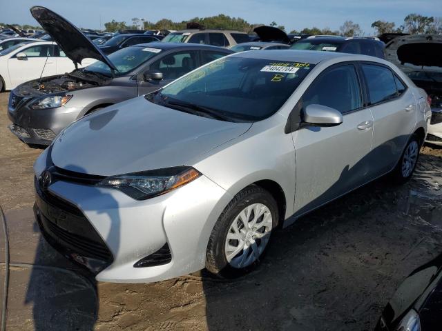 VIN 5YFBURHEXKP878514 2019 Toyota Corolla, L no.1