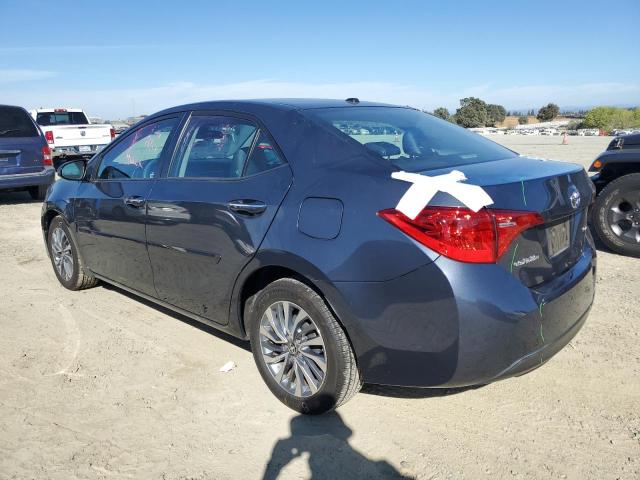 VIN 5YFBURHE9HP571795 2017 Toyota Corolla, L no.2