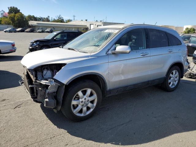 HONDA CR-V EXL 2009 silver 4dr spor gas JHLRE48719C021553 photo #1