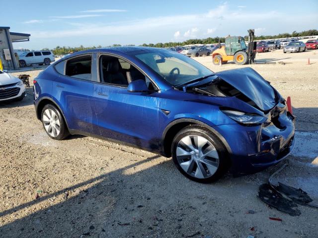 VIN 7SAYGDEE2PA065812 2023 Tesla MODEL Y no.4