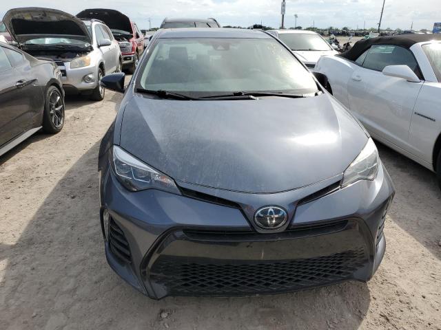 VIN 5YFBURHE4JP827265 2018 Toyota Corolla, L no.5