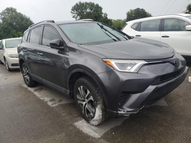 VIN JTMZFREV4JJ157282 2018 Toyota RAV4, LE no.4