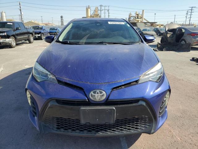 VIN 5YFBURHE5HP639557 2017 Toyota Corolla, L no.5