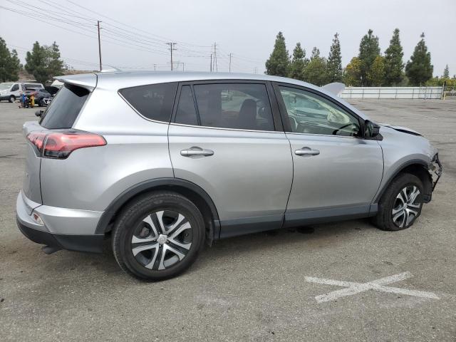 VIN JTMZFREV9JJ179035 2018 Toyota RAV4, LE no.3