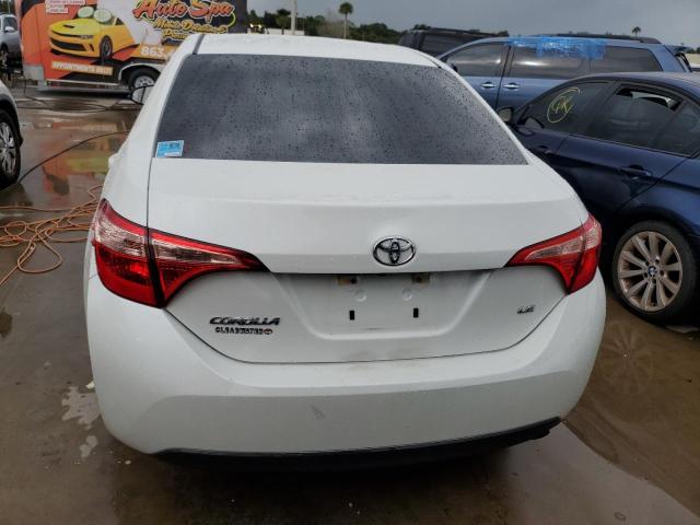 VIN 5YFBURHE4KP880100 2019 Toyota Corolla, L no.6