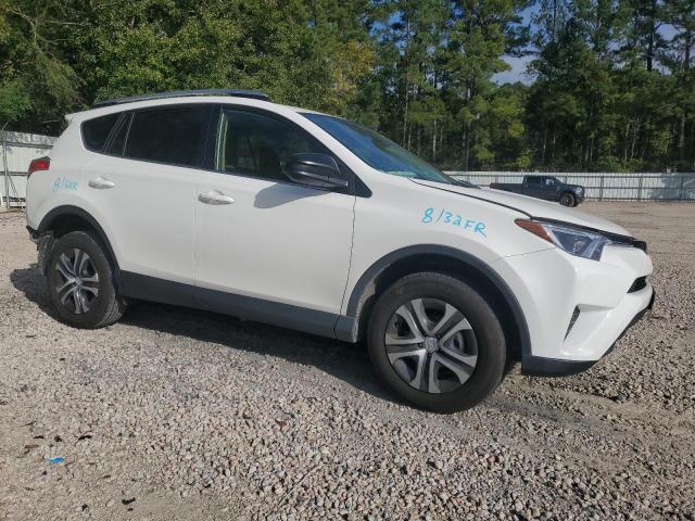 VIN JTMZFREV2HJ105059 2017 Toyota RAV4, LE no.4