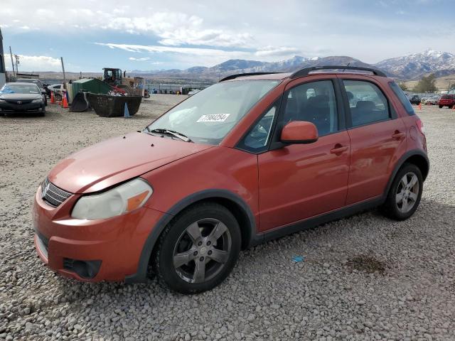 SUZUKI SX4 TECHNO 2009 orange hatchbac gas JS2YB413196203590 photo #1