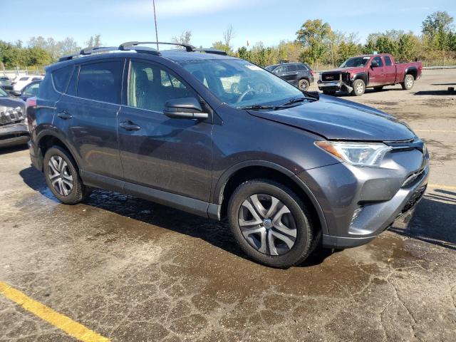 VIN JTMBFREV4JJ720347 2018 Toyota RAV4, LE no.4