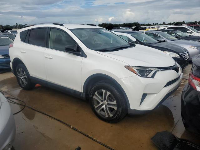 VIN JTMZFREV6JJ206806 2018 Toyota RAV4, LE no.4