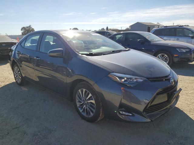 VIN 5YFBURHE9HP571795 2017 Toyota Corolla, L no.4