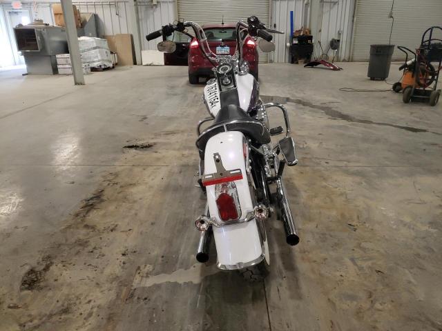 2010 HARLEY-DAVIDSON FLSTN 1HD1JD519AB025588