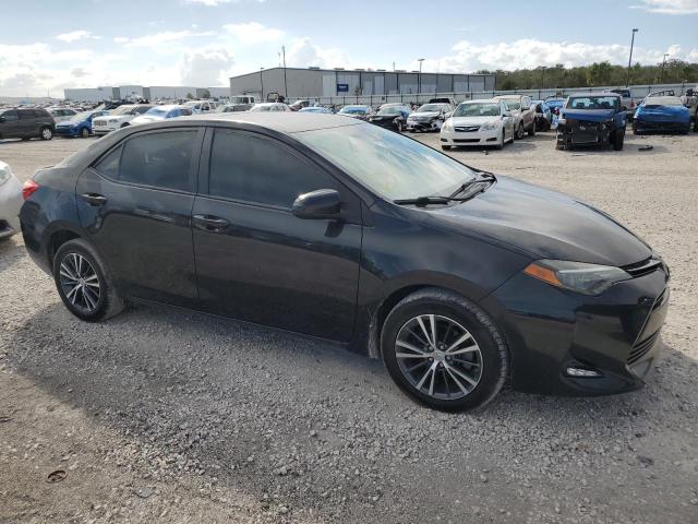 VIN 5YFBURHE9JP839864 2018 Toyota Corolla, L no.4