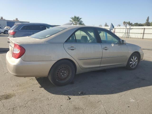 TOYOTA CAMRY LE 2003 gold sedan 4d gas JTDBE32K430155066 photo #4