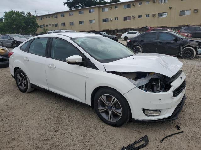 VIN 1FADP3FEXHL253103 2017 Ford Focus, SE no.4