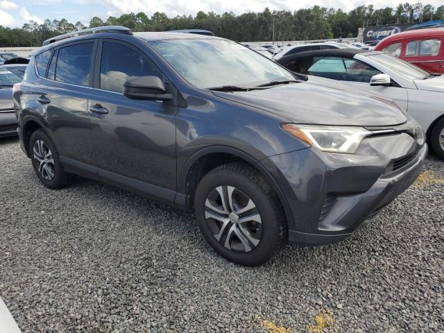 VIN JTMZFREV8JJ150870 2018 Toyota RAV4, LE no.4