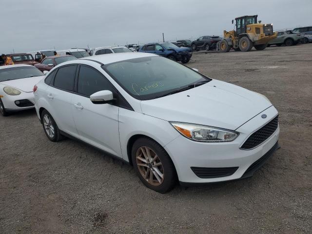 VIN 1FADP3F27FL252932 2015 Ford Focus, SE no.4