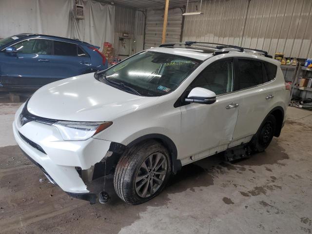 VIN JTMDFREV8JJ260201 2018 Toyota RAV4, Limited no.1