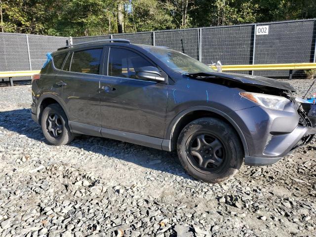 VIN JTMBFREV2HJ139102 2017 Toyota RAV4, LE no.4