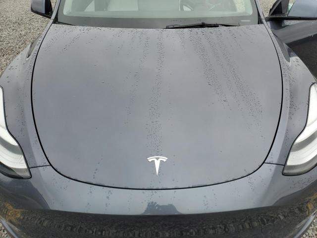 VIN 7SAYGDEE4NF311825 2022 Tesla MODEL Y no.11