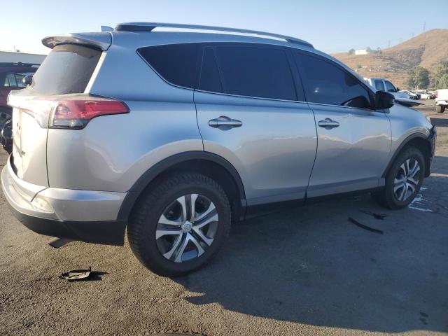 VIN JTMZFREV8JJ167586 2018 Toyota RAV4, LE no.3