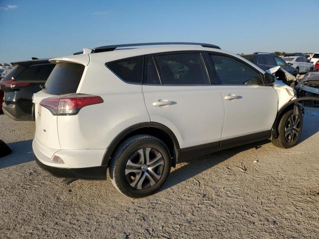 VIN JTMZFREV8HJ700434 2017 Toyota RAV4, LE no.3