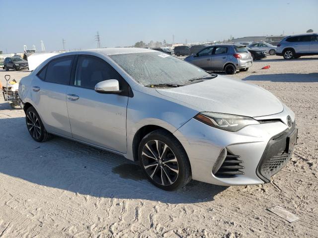 VIN 5YFBURHE0JP854057 2018 Toyota Corolla, L no.4