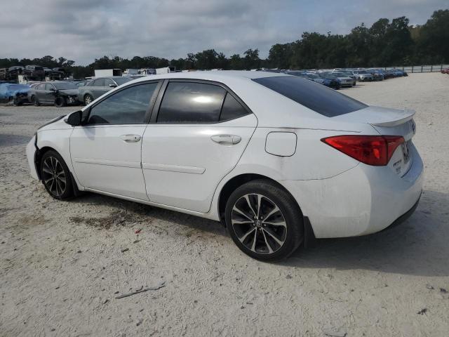 VIN 5YFBURHE8JP774716 2018 Toyota Corolla, L no.2