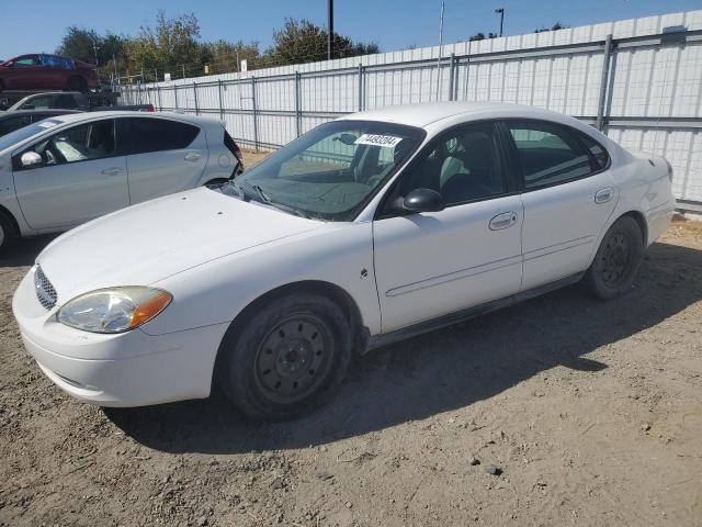 FORD TAURUS LX 2001 white sedan 4d flexible fuel 1FAFP52281A246183 photo #1