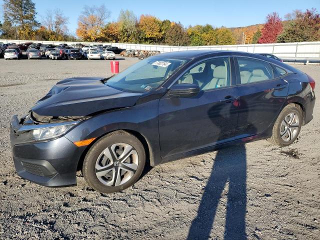Vin: 2hgfc2f52jh505200, lot: 77802764, honda civic lx 2018 img_1