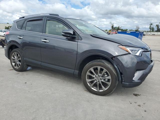 VIN JTMYFREV0JJ160160 2018 Toyota RAV4, Limited no.4