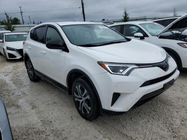 VIN JTMZFREV5JJ734952 2018 Toyota RAV4, LE no.4