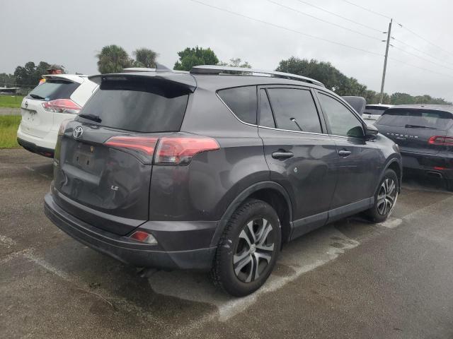 VIN JTMZFREV4JJ157282 2018 Toyota RAV4, LE no.3