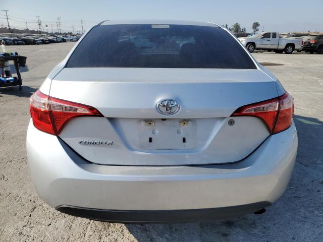 VIN 5YFBURHE7HP682846 2017 Toyota Corolla, L no.6