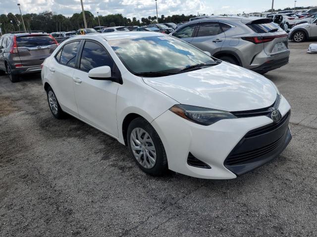 VIN 5YFBURHE3HP715308 2017 Toyota Corolla, L no.4