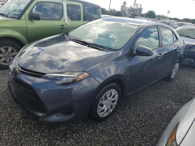 VIN 5YFBURHE5JP810667 2018 Toyota Corolla, L no.1